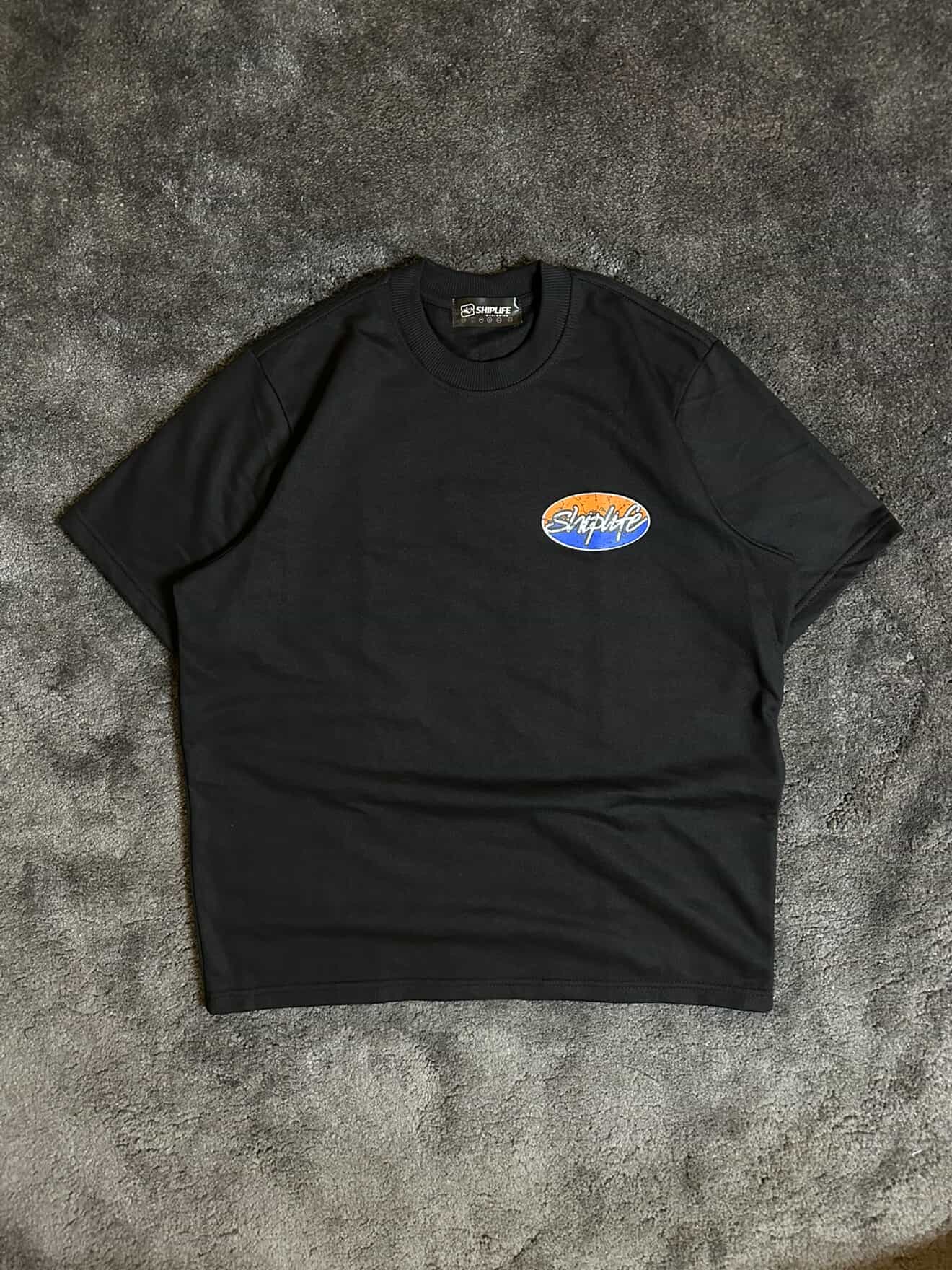 Shiplife Worldwide T-Shirt 2026 – Black/Mustard | Pre-Sale